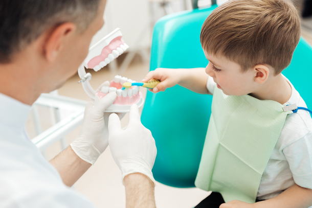 A young boy at the dentist